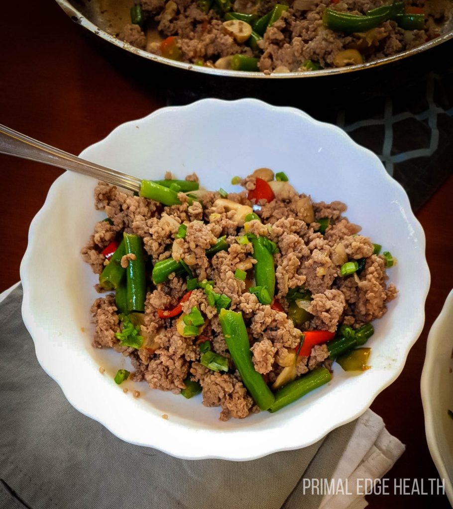 Keto Ground Beef Stir Fry in a white bowl.