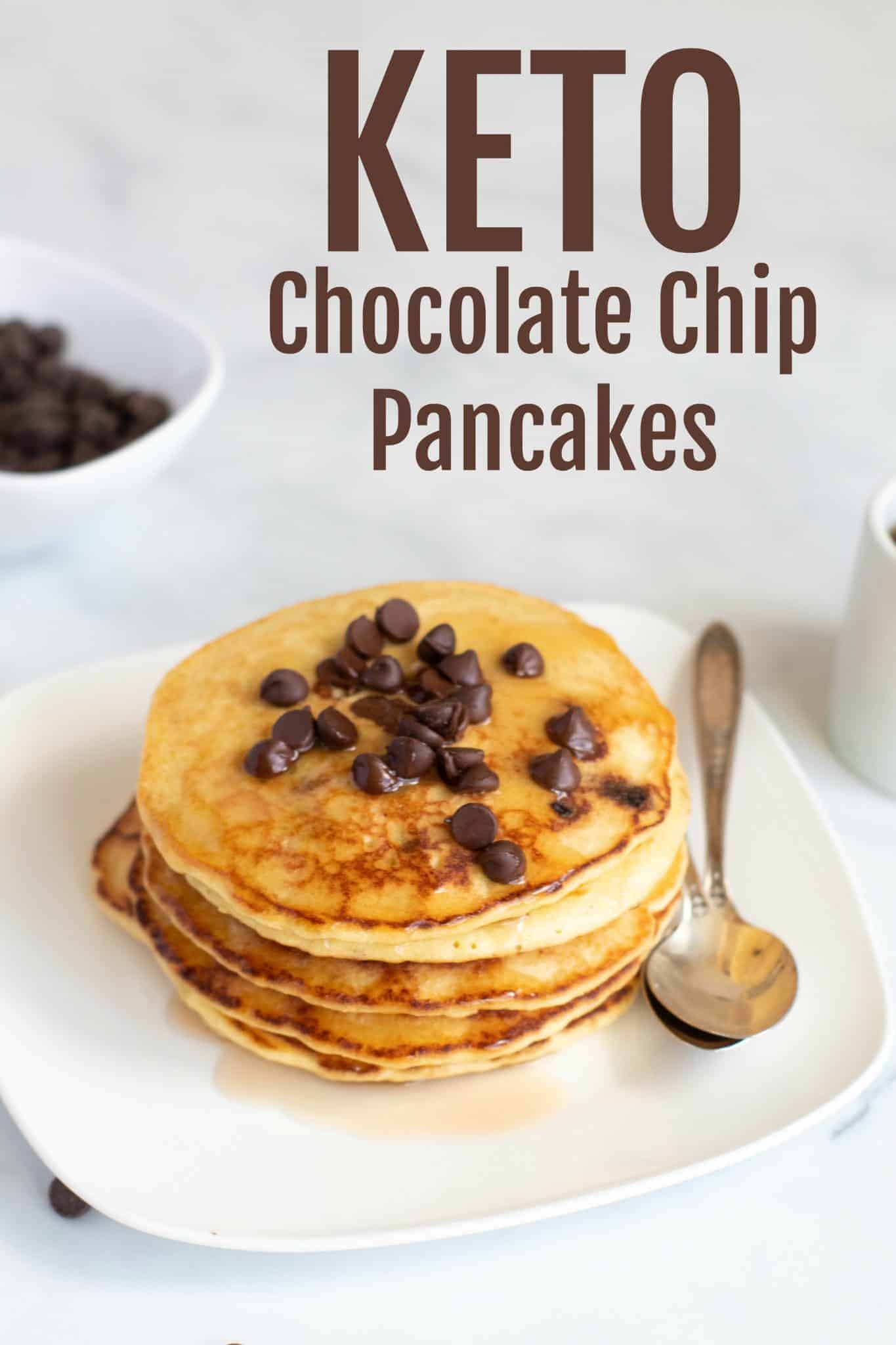 Keto Chocolate Chip Pancakes on a plate with a spoon.