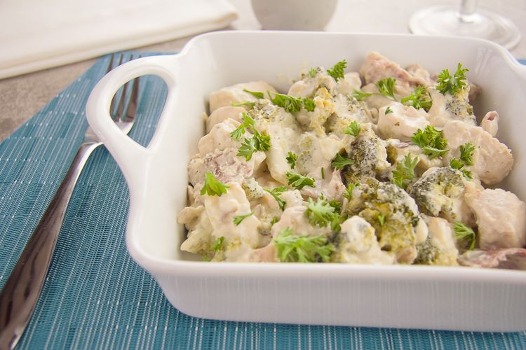 Skillet chicken broccoli in a white dish.
