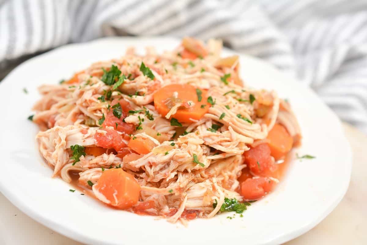 A plate of a keto friendly meal on a white surface.