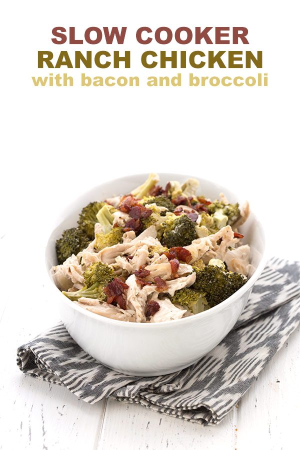 Slow cooker Ranch Chicken with bacon and broccoli in a white bowl.