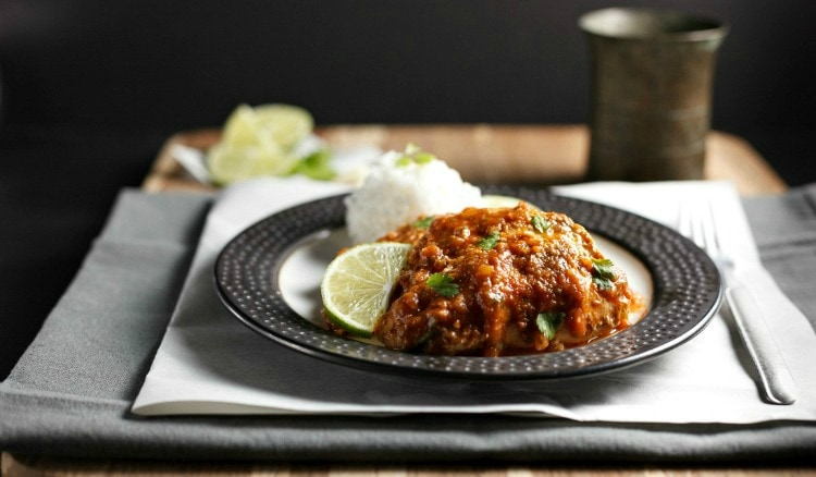 Slow Cooker Garlic Chipotle Lime Chicken on a black plate.