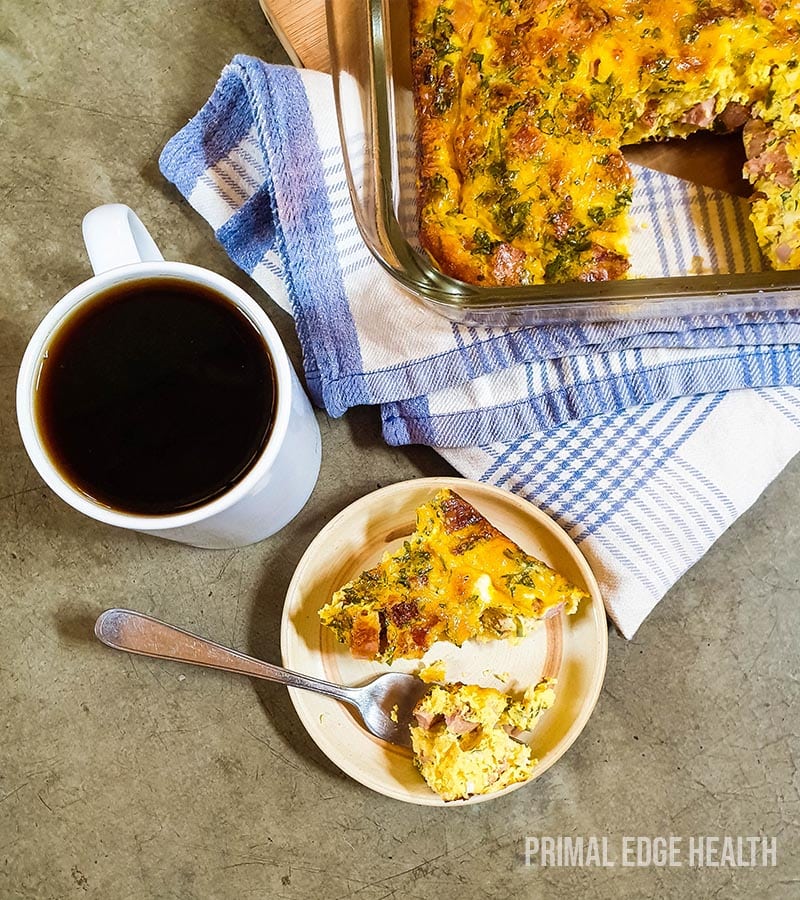 A serving of baked omelette with a cup of coffee.