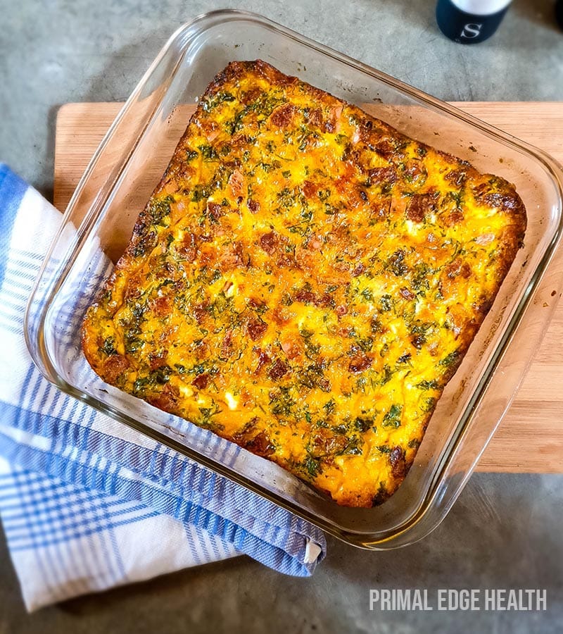 Baked omelette in a square glass dish.