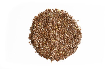 Flax seeds on a white background.