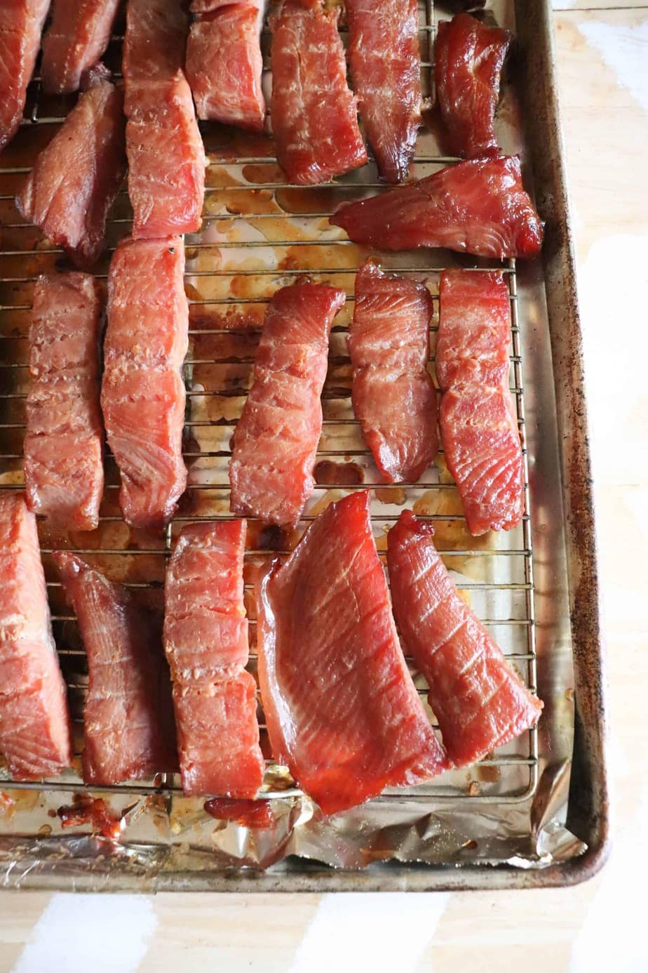 A batch of keto smoked salmon on a wire rack.