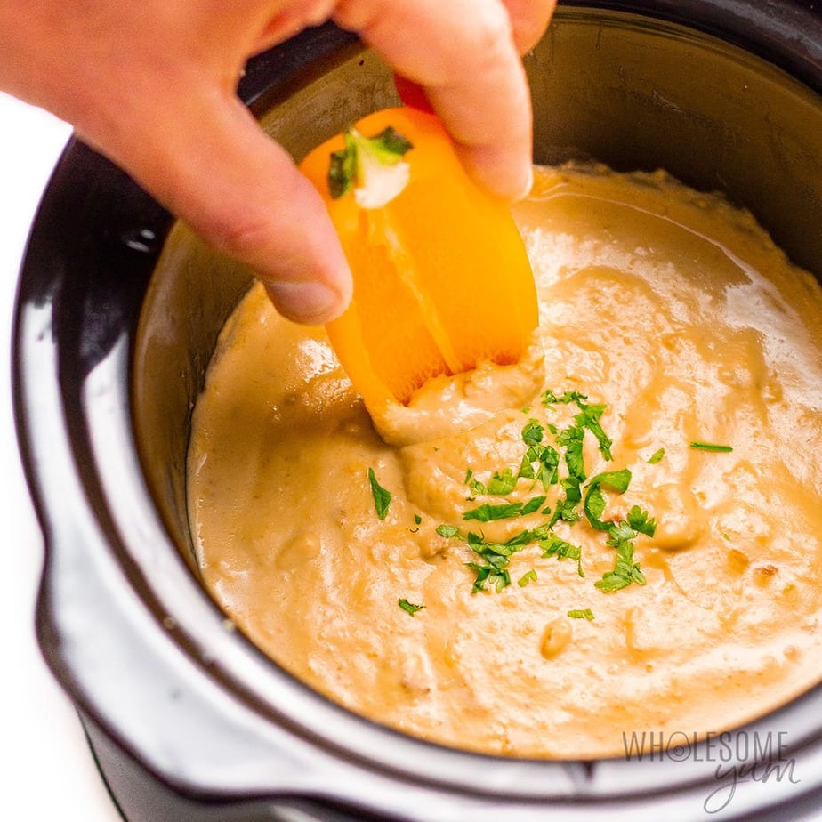 Wholesomeyum crock pot keto queso dip in a pot.