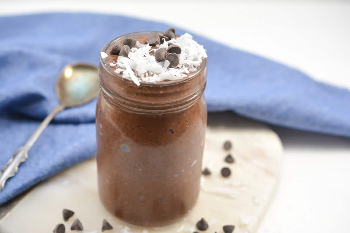 Keto chocolate chia seed pudding in a glass.