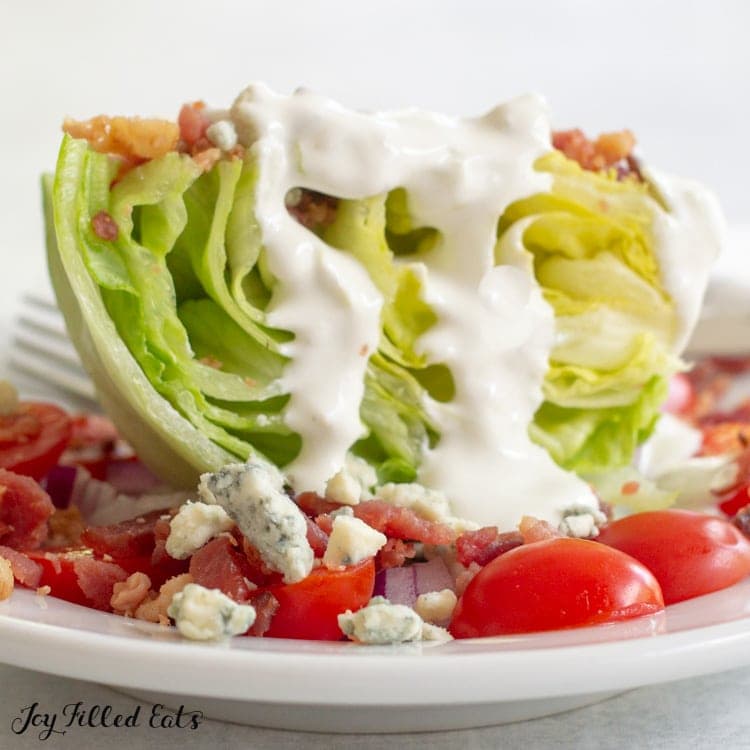 A serving of salad with keto blue cheese dressing.
