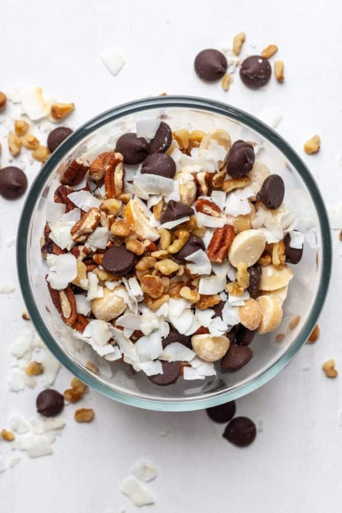 Keto trail mix in a clear bowl.