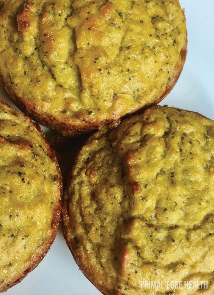 A batch of golden brown savory muffins.
