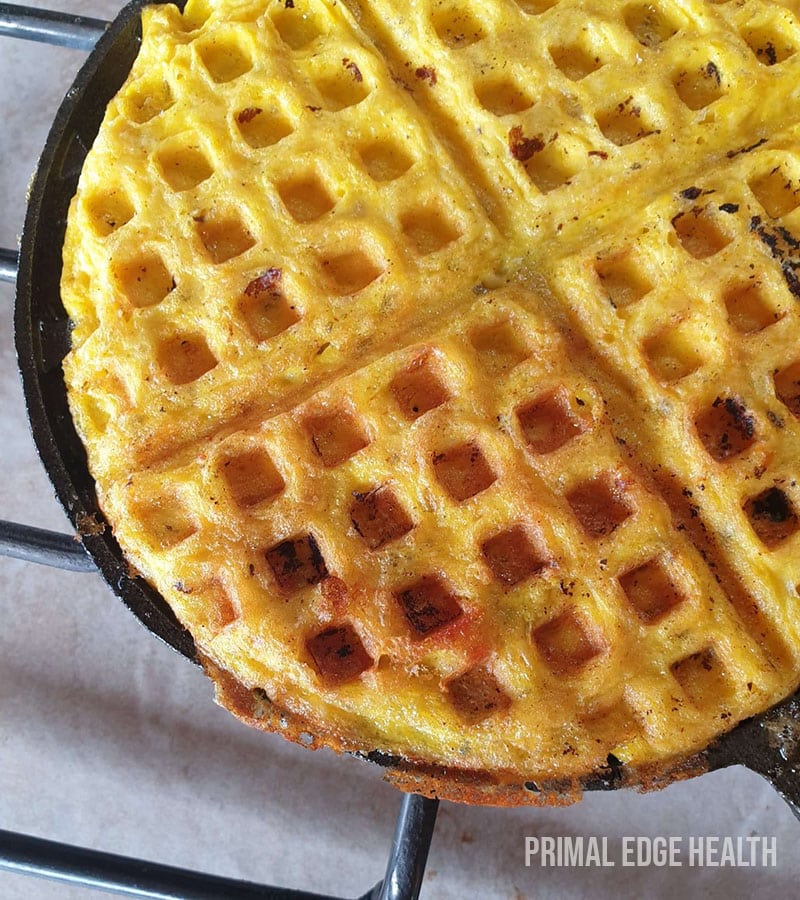 Carnivore waffle on a black pan.