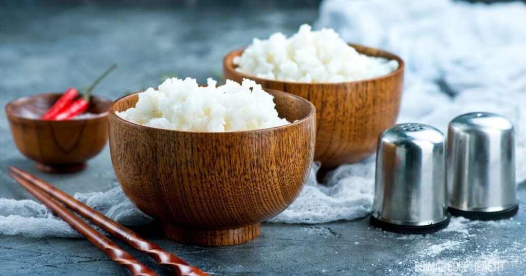 A picture of easy keto cauliflower rice in two wooden bowls.