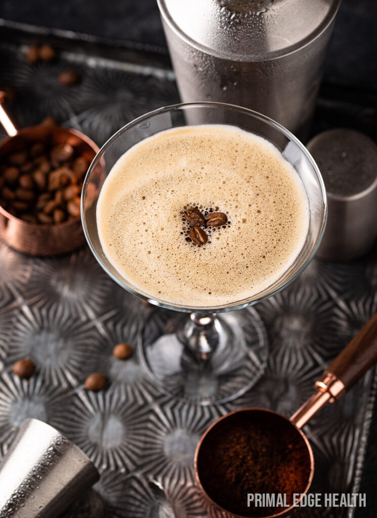 Creamy espresso martini presented on a tray.