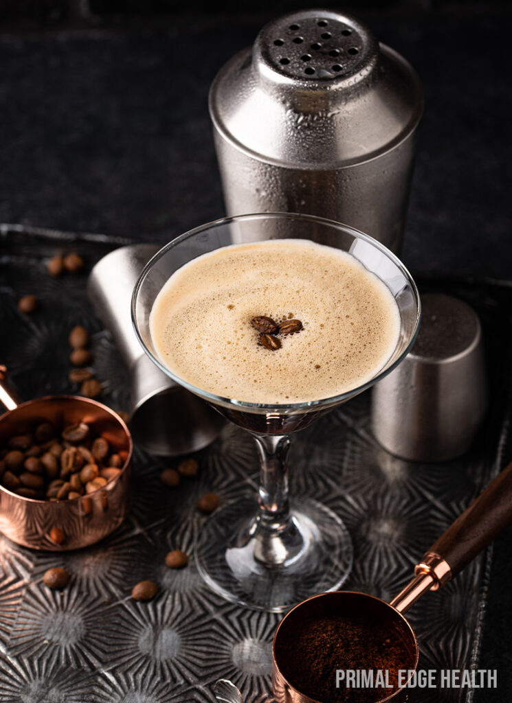 Espresso martini garnished with coffee beans.