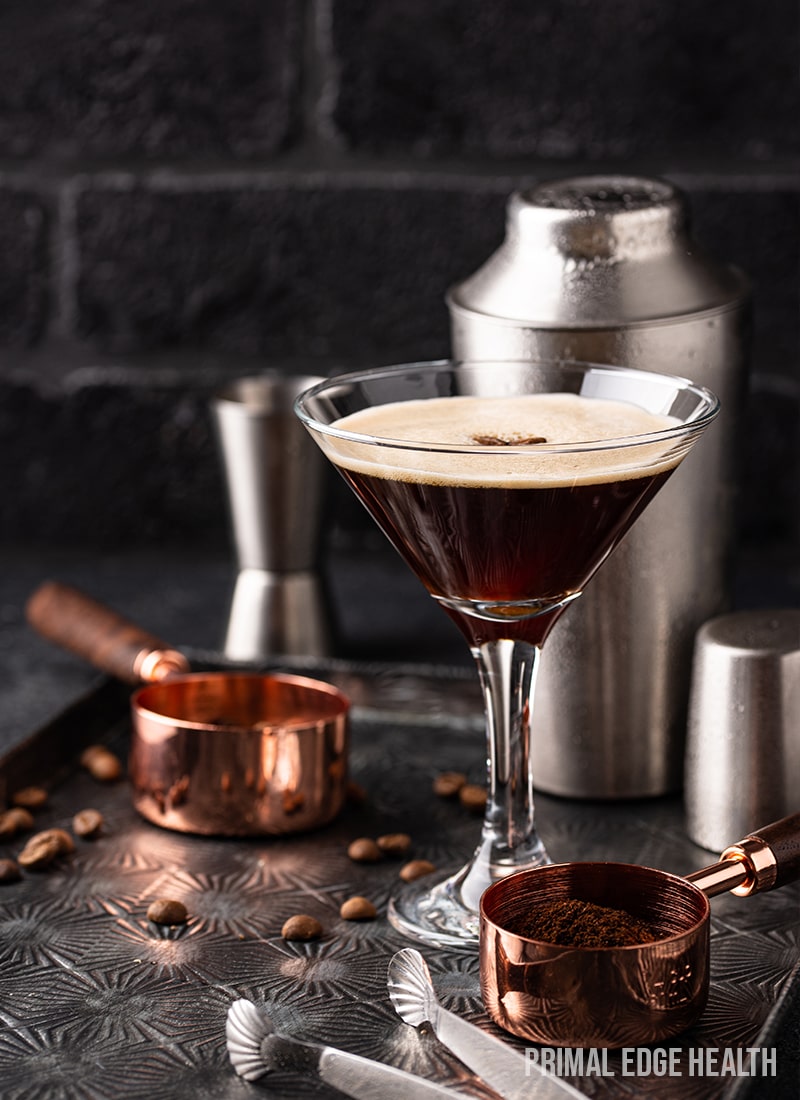 Espresso martini served in a stemmed glass.