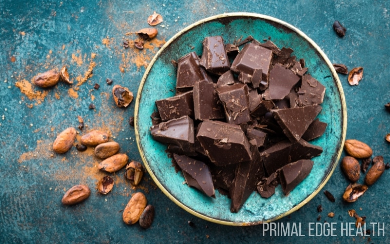 Pieces of chocolate on a blue plate.
