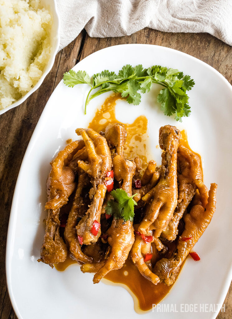 Adidas chicken feet adobo served with cauliflower rice.