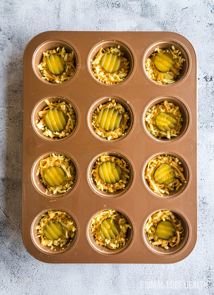 keto pickle chips with cheese in muffin pan