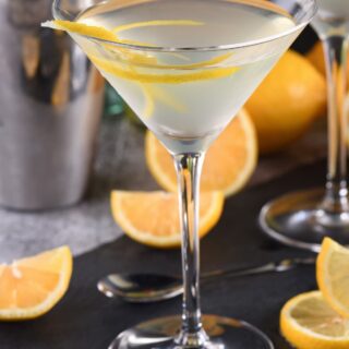 keto vodka lemon drop martini in a glass with lemon twist
