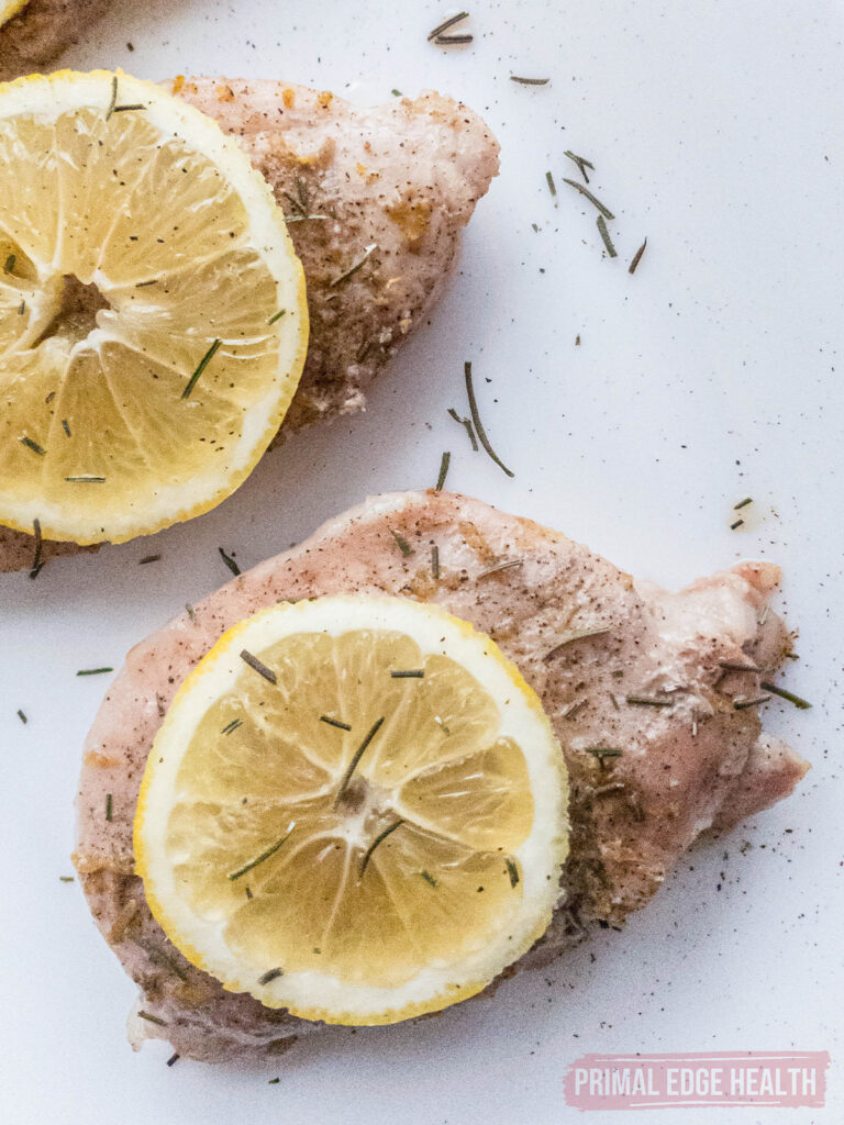 Pork chops with lemon and herb seasoning.