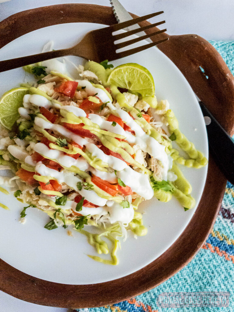 keto mexican tostada plated with a fork alongside