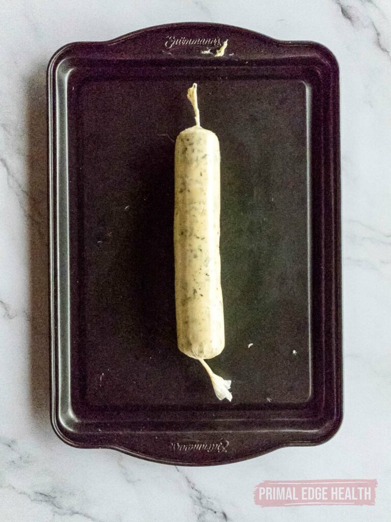 Rosemary compound butter on baking sheet.