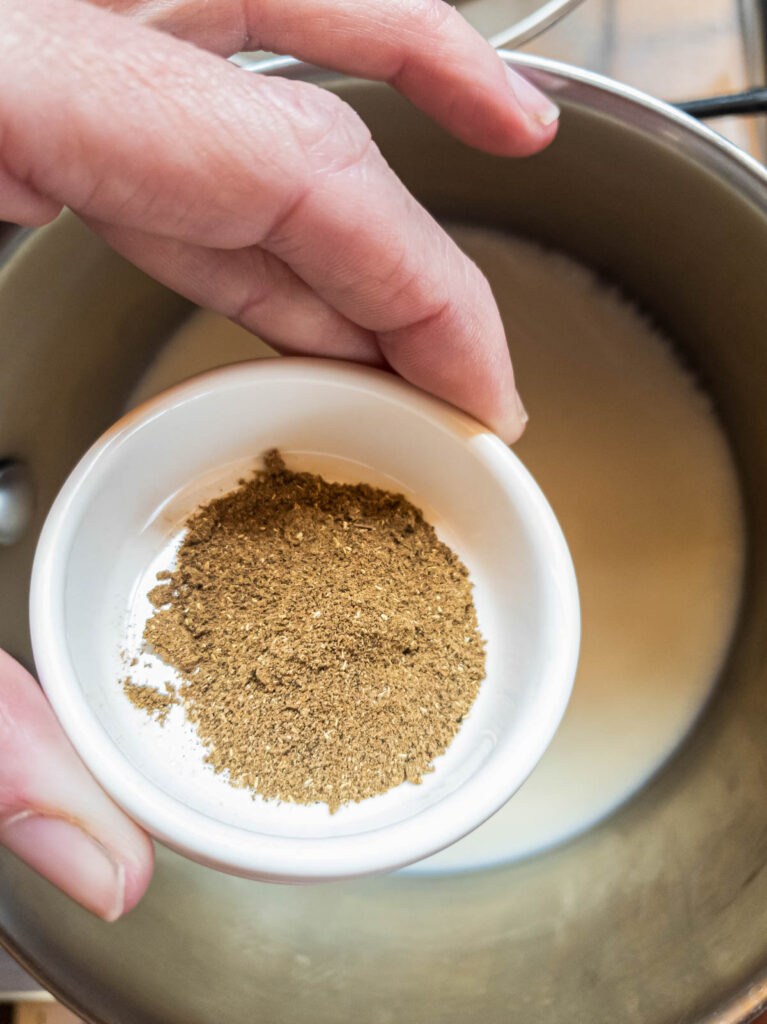 Bowl of ashwagandha, ready to be mixed into the coffee in a saucepan.