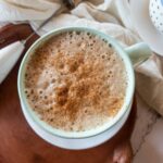 Overhead view of ashwagandha coffee with cheesecloth accent.