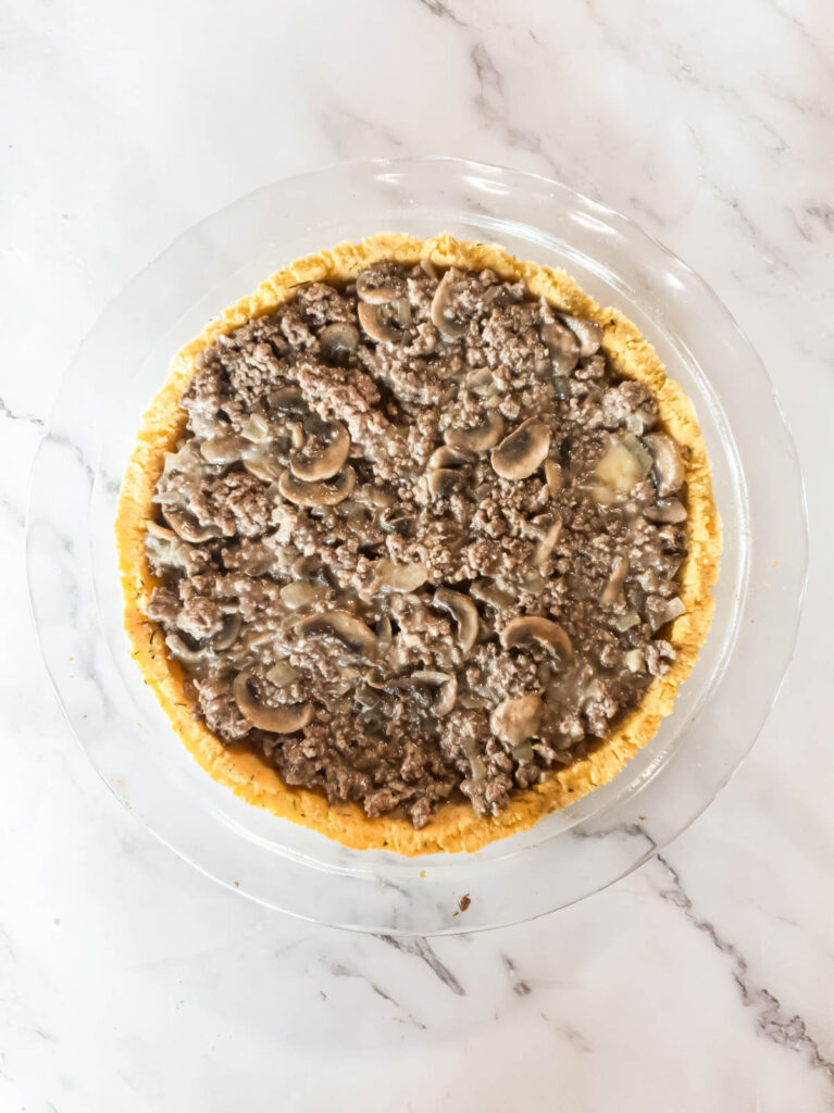 A keto meat pie, prepped and ready to go in the oven.