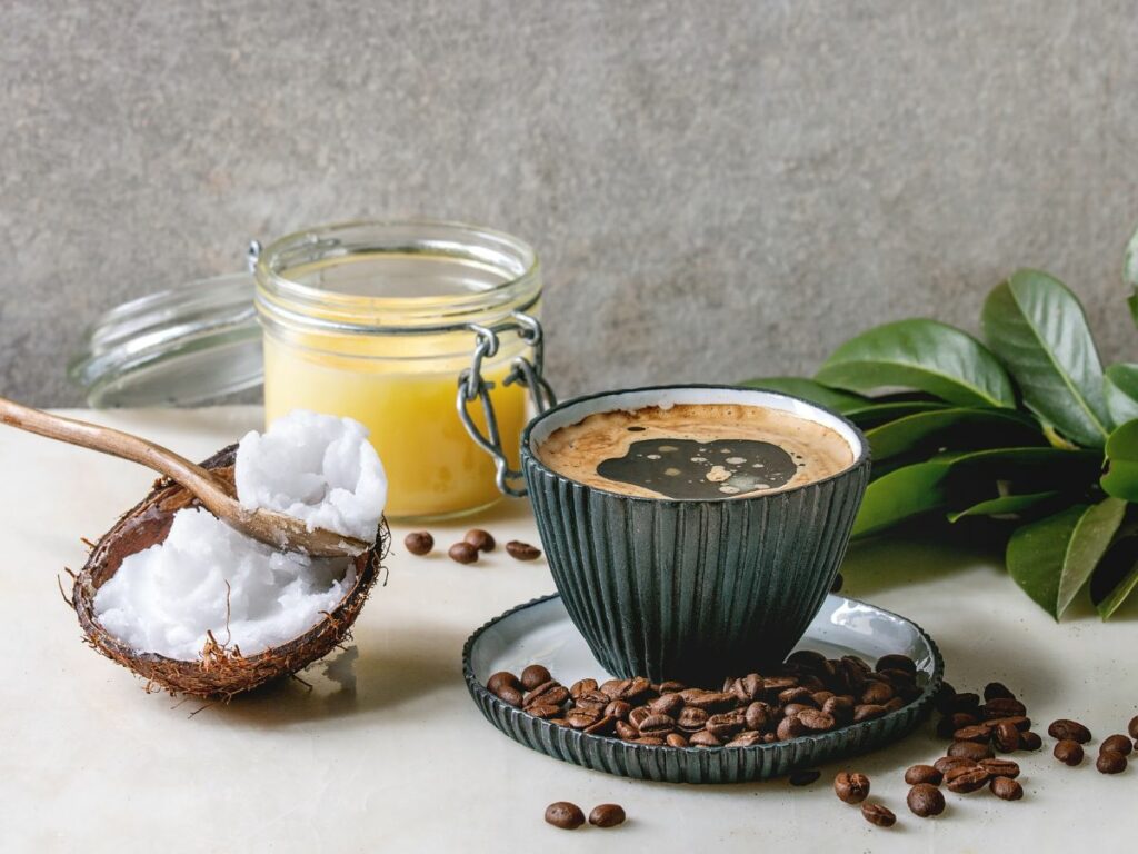 A cup of coffee and coconut oil.