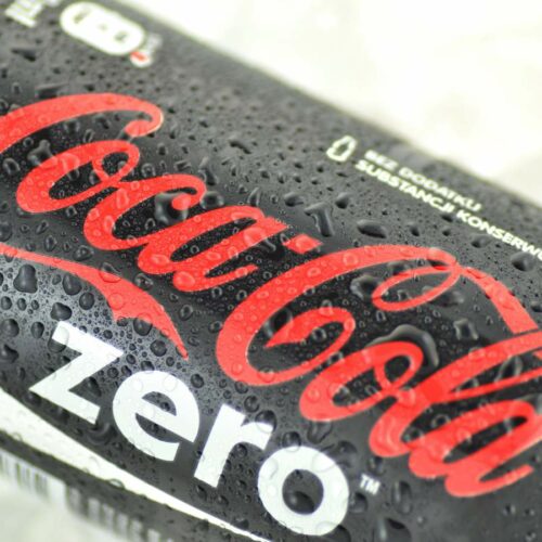 Close-up of a coca-cola zero can with water droplets.