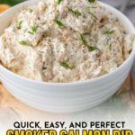 A white bowl filled with creamy smoked salmon dip garnished with fresh dill; text overlay reads “Quick, Easy, and Perfect Smoked Salmon Dip with Cream Cheese.”.