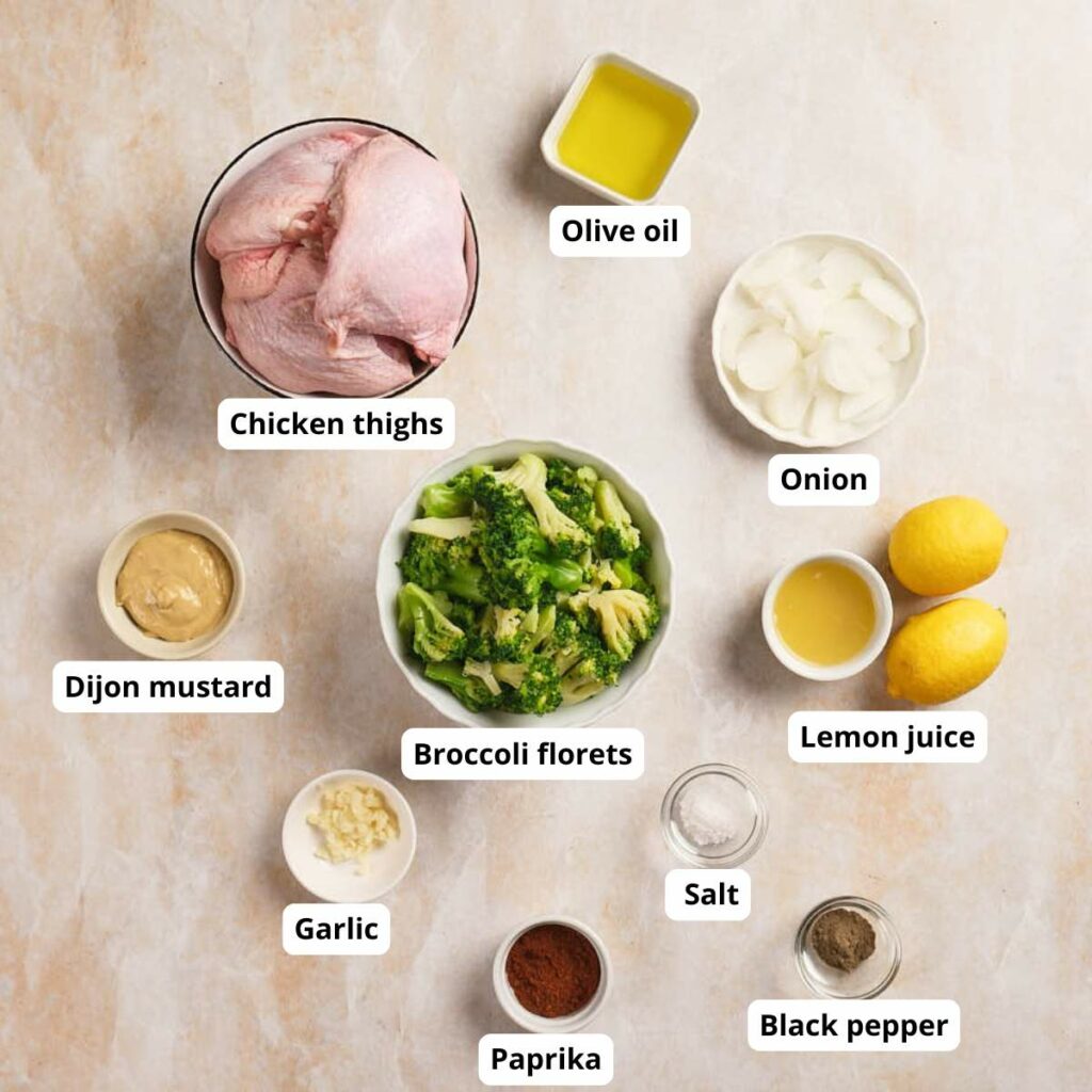 Raw chicken thighs, broccoli florets, sliced onion, olive oil, lemon juice and other ingredients.