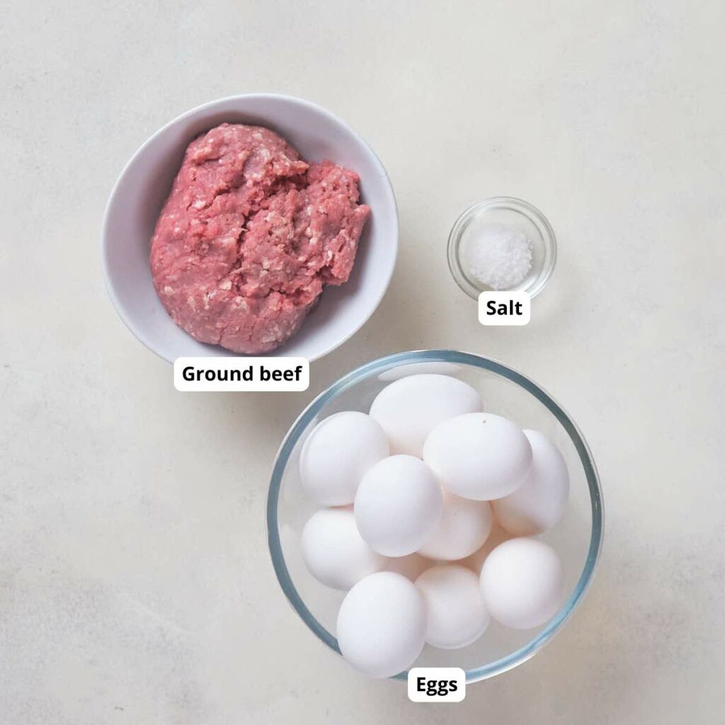 Three ingredients including eggs, ground beef and salt for the egg muffins recipe.