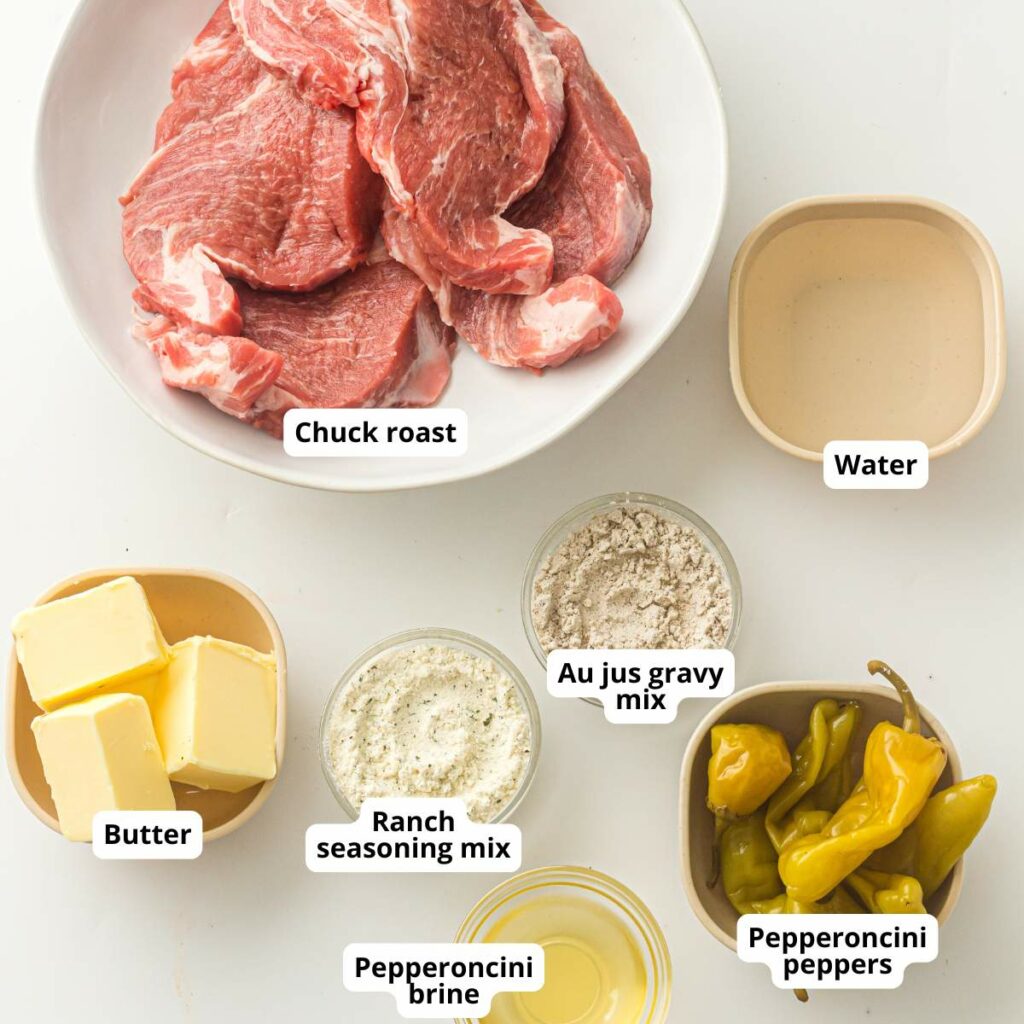 Ingredients for Mississippi pot roast laid out on a white surface.