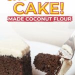 Slice of chocolate cake with white frosting on a white plate, being eaten with a fork.