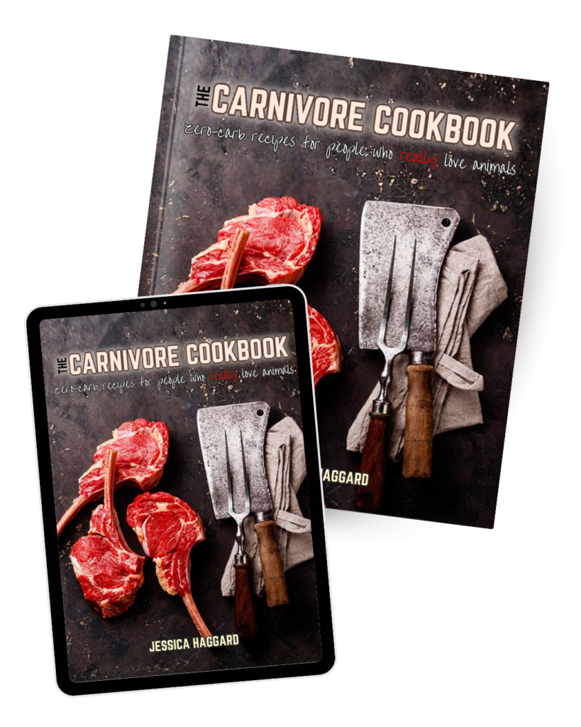 A print book and tablet displaying the cover of "The Carnivore Cookbook," a standout among cookbooks, with raw steaks and meat cleavers on a dark surface.